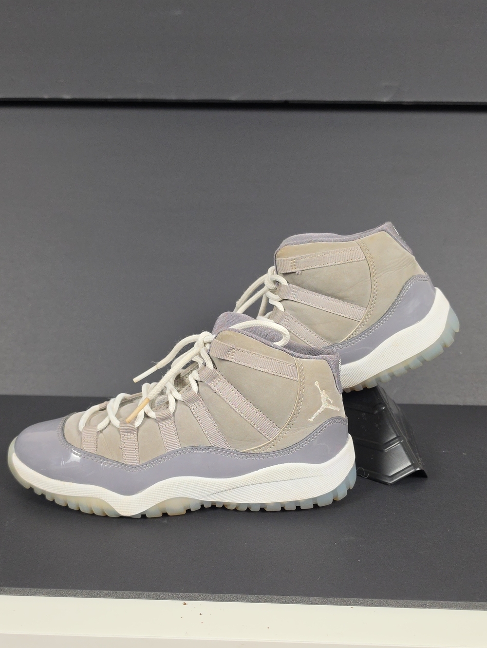 Nike Air Jordan 11 Retro sneakers in the iconic "Cool Grey"
